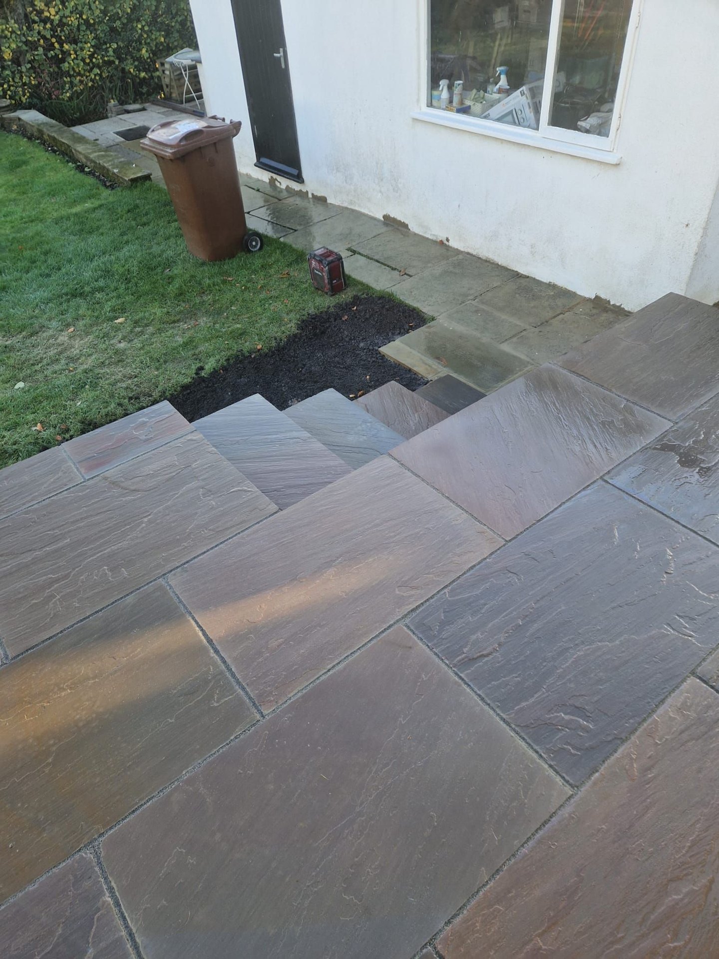 Raj Blend Indian stone with 140mm coursed Yorkshire stone walls in Bramhope