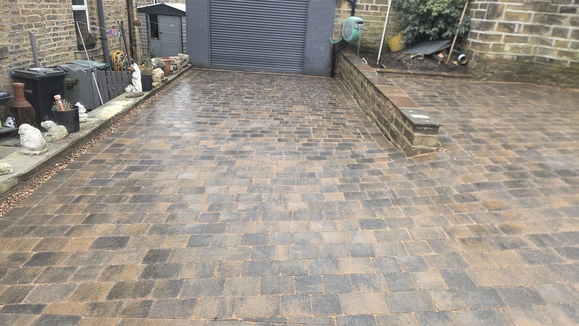 Plaspave Sorrento Sarsen Stone paving with reused stone walls and steps in Howarth