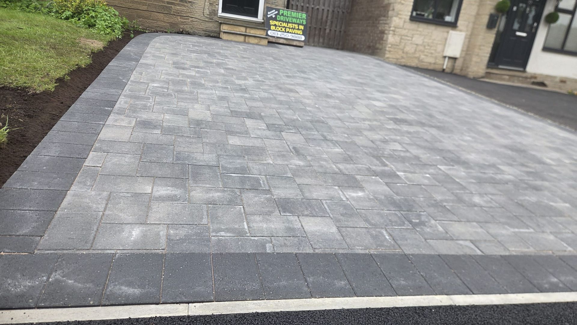 Positano Granite driveway with Charcoal border in Calverley