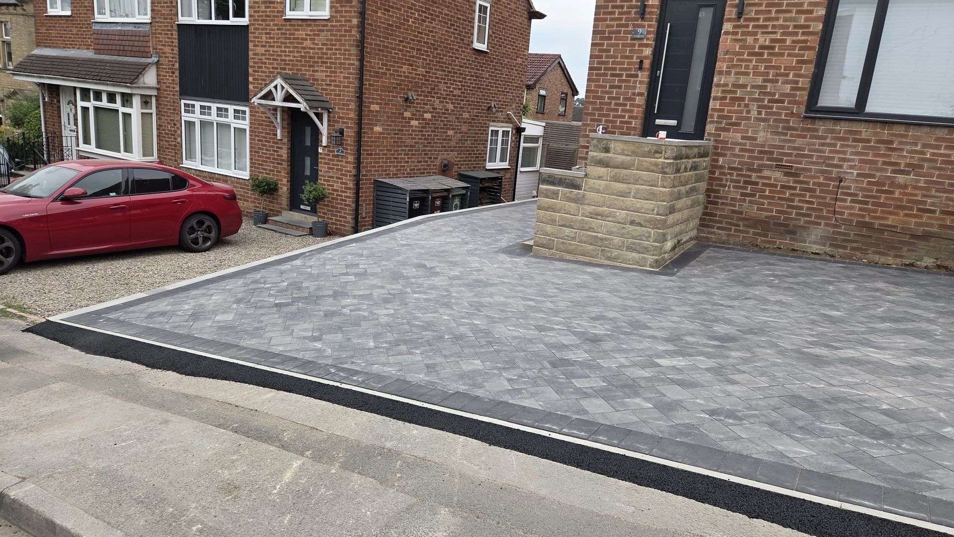 Positano Granite driveway with Charcoal border in Rodley