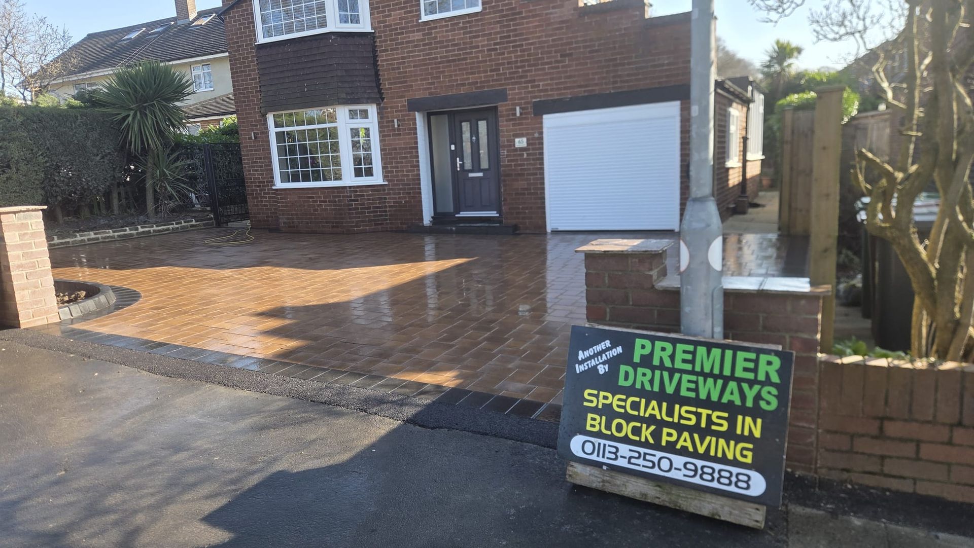 Positano Peakstone driveway with Charcoal border and new wall in Cookridge