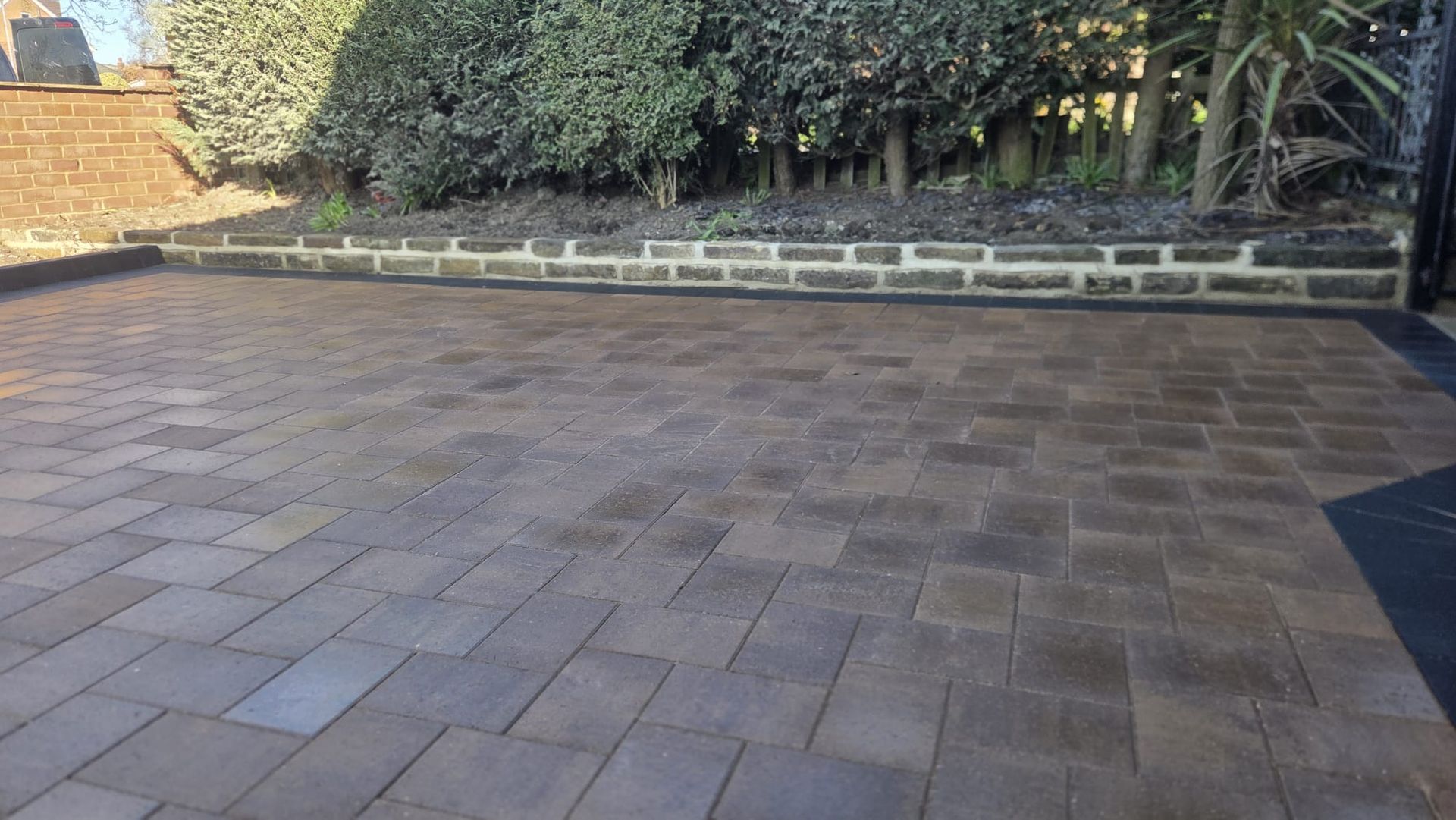 Positano Peakstone driveway with Charcoal border and new wall in Cookridge