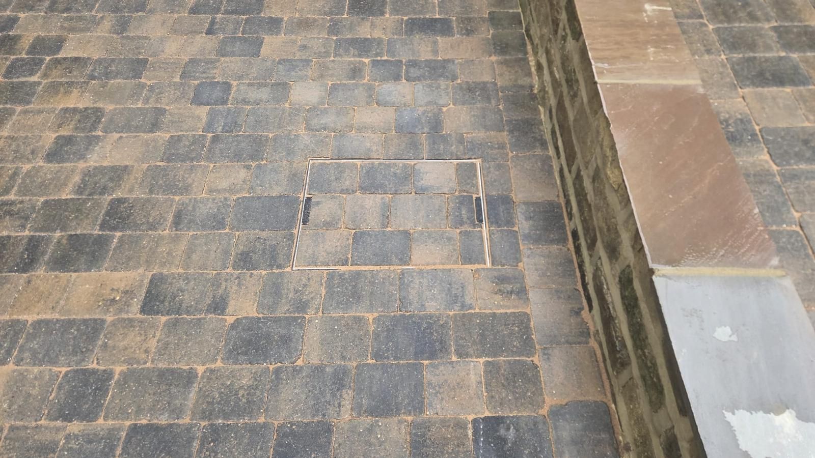 Completed natural stone patio with matching garden steps