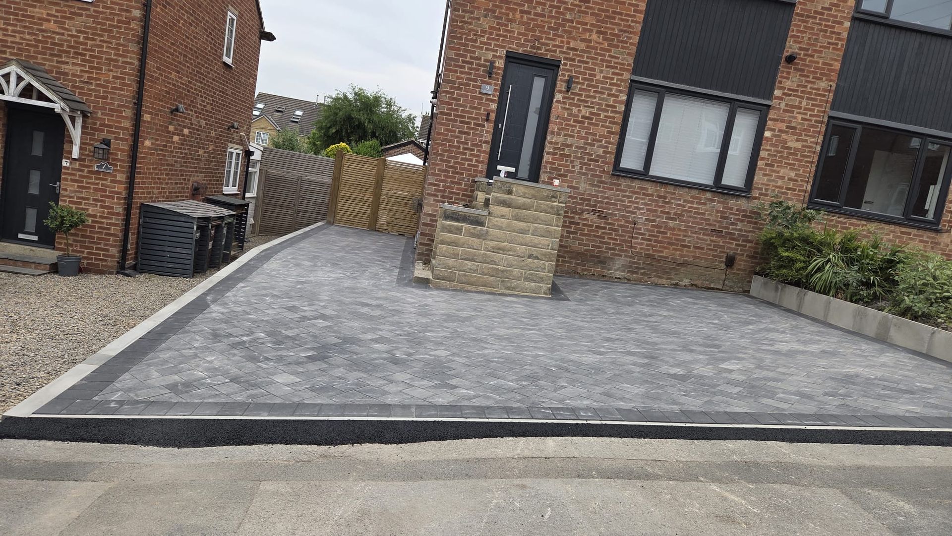 Positano Granite driveway with Charcoal border in Rodley