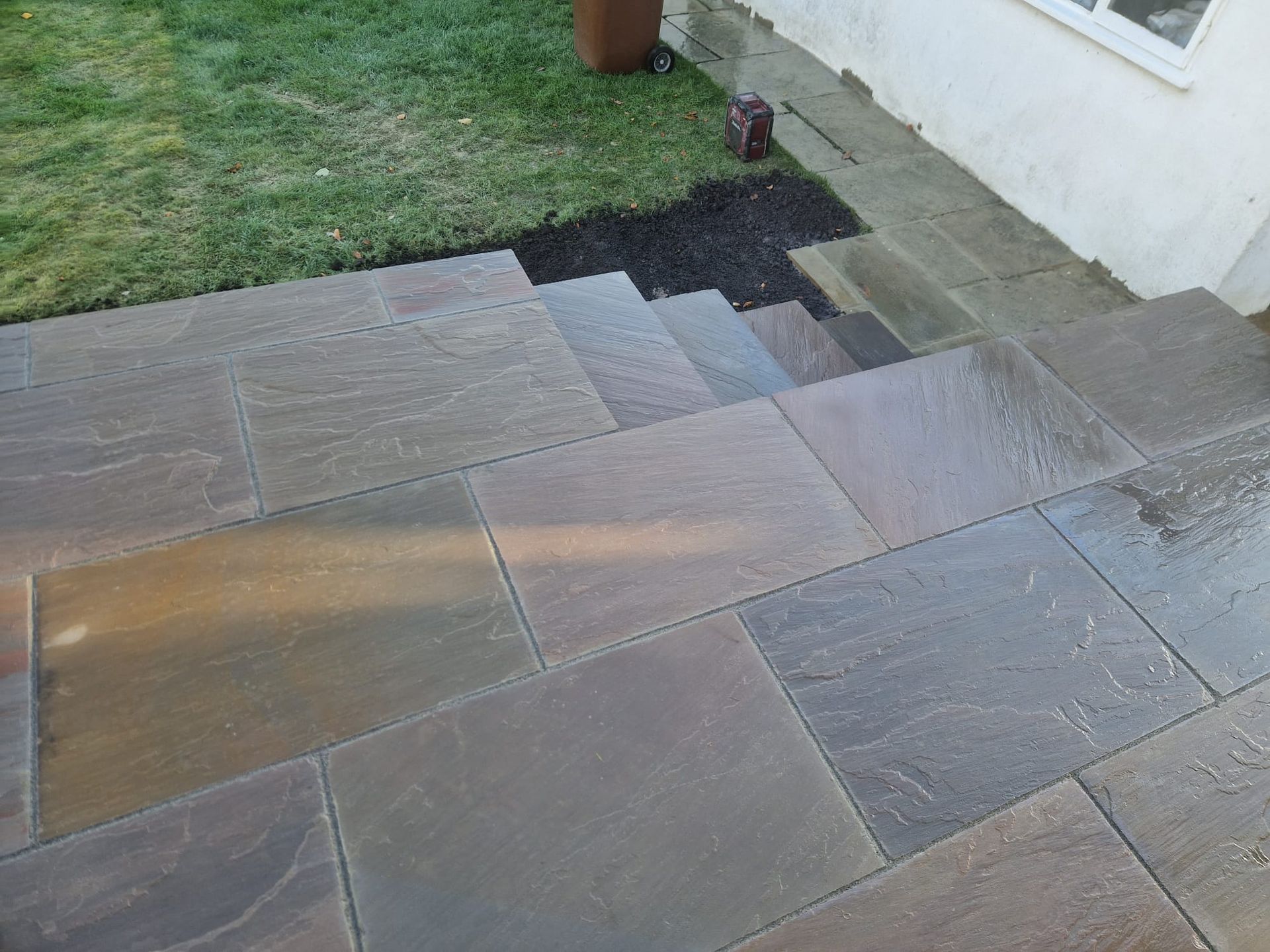 Raj Blend Indian stone with 140mm coursed Yorkshire stone walls in Bramhope